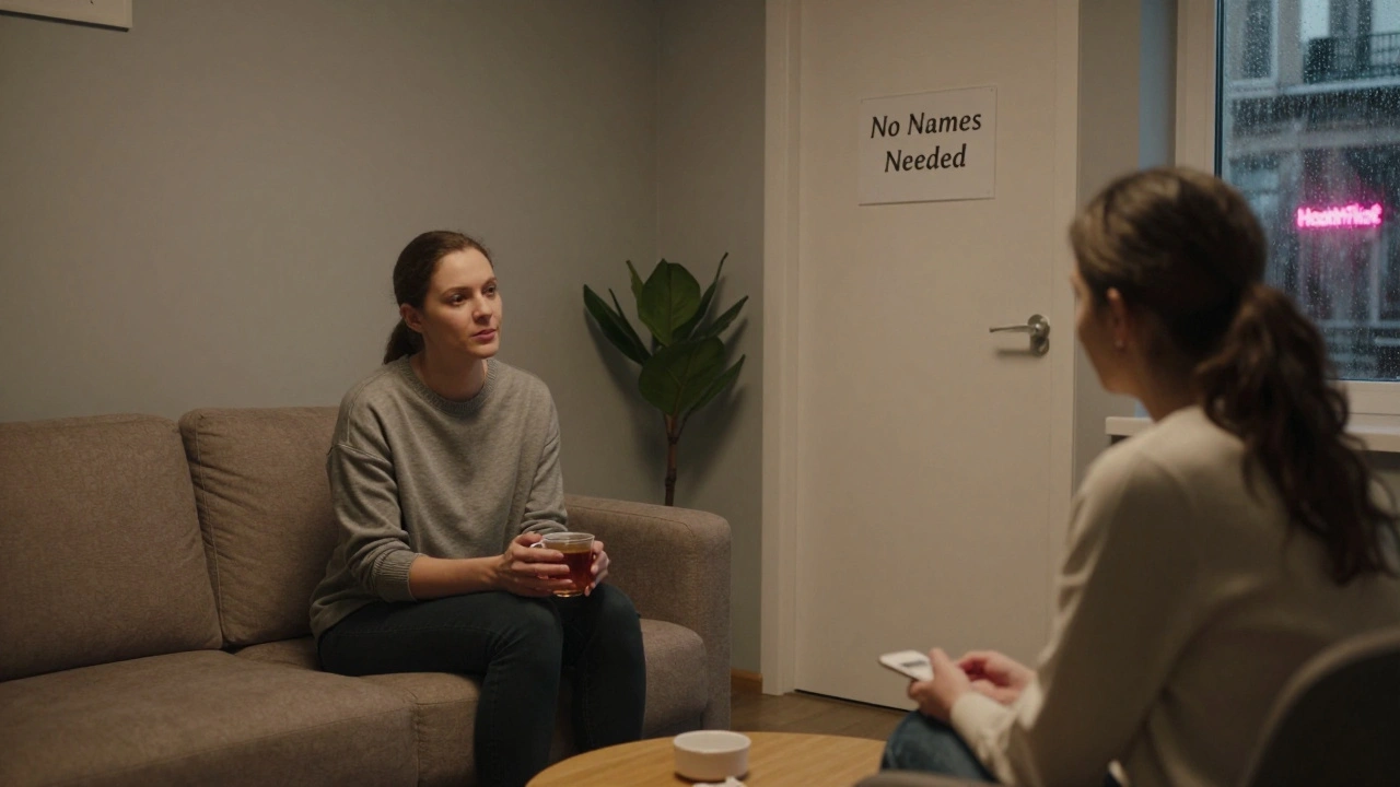 A counselor listens quietly to a client in a private, welcoming room with no names required.